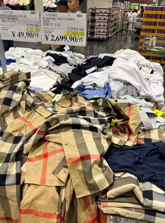 超市羽绒服陈列图片_超市能过冬拿捏产羽绒服吗_